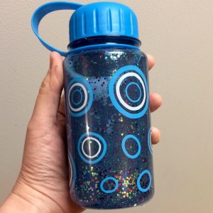 Sensory jar full of glitter and baby oil